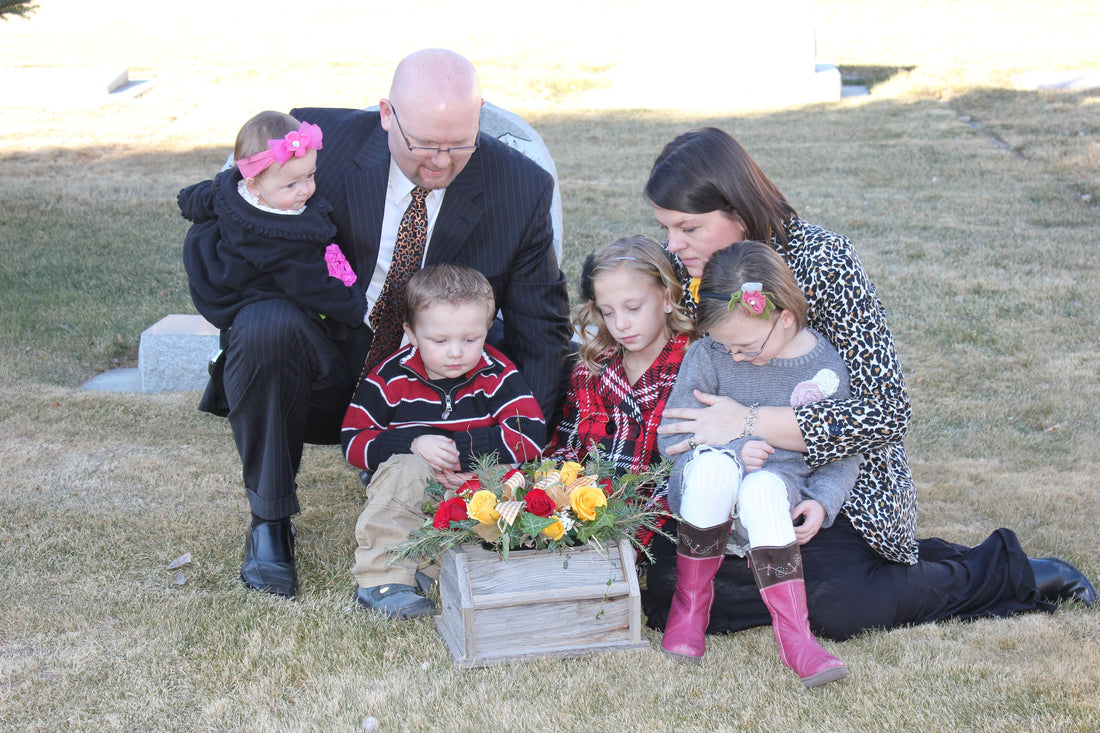 Family at gravesite