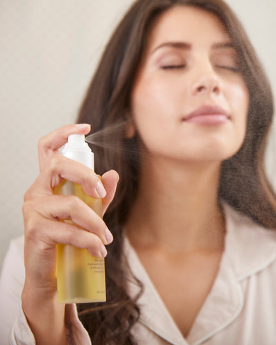 Woman using PMD Skincare for mobile background