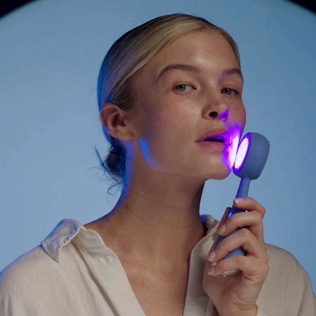 Woman using the PMD Clean acne for desktop background