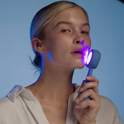 Woman using the PMD Clean acne for mobile background