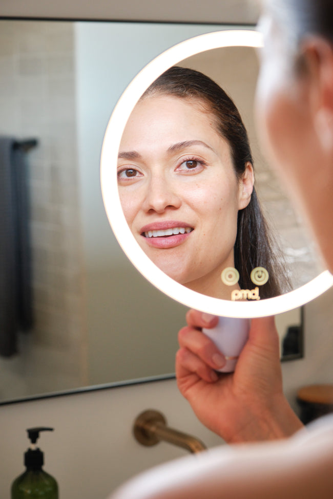 Woman using PMD reflect pro for desktop background